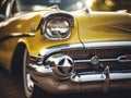 a close up of a classic yellow car