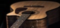 Close-up of a classical acoustic guitar on a black background Royalty Free Stock Photo