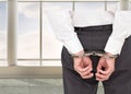 Close up on classy businessman wearing handcuffs Royalty Free Stock Photo