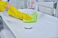 Close-up of cleaning sink with faucet in bathroom, hands in gloves with detergent Royalty Free Stock Photo