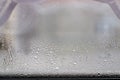 Close-up clear drops of water on window glass surface Royalty Free Stock Photo