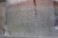 Close-up clear drops of water on window glass surface Royalty Free Stock Photo