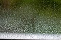 Close-up clear drops of water on window glass surface Royalty Free Stock Photo