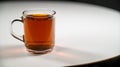 Close up of clear glass cup mug of rich fresh black tea