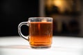 Close up of clear glass cup mug of rich fresh Ceylon black tea