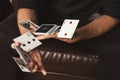 Close-up clever hands of magician with gambling cards Royalty Free Stock Photo