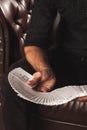 Close-up clever hands of magician with gambling cards Royalty Free Stock Photo