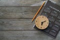 Close up of clock, calendar and pencil on the table Royalty Free Stock Photo