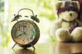 Close up clock on wooden table Royalty Free Stock Photo