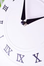 Close up clockwise. The face of the white wall clock. Royalty Free Stock Photo