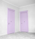 Close up of closed wooden door in the empty room Royalty Free Stock Photo