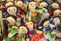 Close-up of cloth dolls for sale with smiley faces Royalty Free Stock Photo