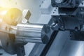 Close up of the CNC lathe clamping raw material Royalty Free Stock Photo