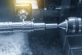 Close up of the CNC lathe Turning machinecutting brass shaft Royalty Free Stock Photo