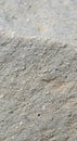 Close-up of a coarse, textured concrete surface. The material displays a variety of Royalty Free Stock Photo