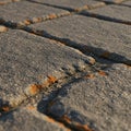 Close-up of a cobblestone pavement showing rectangular stones with rough, Royalty Free Stock Photo