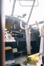 A close up of the cockpit of a vintage airplane. The steering wheel, dashboard, seat and climb levers are visible. Decommissioned