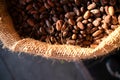 close-up of cocoa seeds in raffia bag