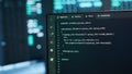Close up of code running on PC display in high tech data center Royalty Free Stock Photo