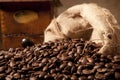 Close-up of coffe beans with juta bag and grinder Royalty Free Stock Photo