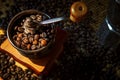 Close up coffee bean roasted in vintage style of manual grinder Royalty Free Stock Photo