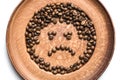 Close up of coffee beans on brown plate Royalty Free Stock Photo