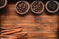Close up of coffee beans in wooden bowl and cinnamon Royalty Free Stock Photo
