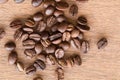 Close up of coffee beans on wooden desk Royalty Free Stock Photo