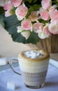 Close up of coffee cream in glasses cup on the table Royalty Free Stock Photo