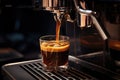 close-up of coffee pouring into cup from smart machine