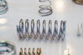 Close up the coil spring parts in light blue scene Royalty Free Stock Photo