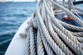 close-up of coiled ropes on the deck of a sailboat