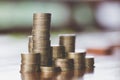 Close up of coins to stack of coins, Business Growth concept, T Royalty Free Stock Photo
