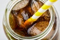 Close up of cola with ice and paper straw in jar, top view. Royalty Free Stock Photo