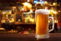 Cold mug of beer in a bar on wooden table Royalty Free Stock Photo