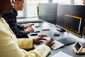 Colleagues writing codes on computers Royalty Free Stock Photo