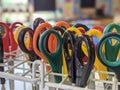 A close up of a collection of classroom scissors handles in a rack Royalty Free Stock Photo