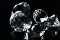close up of collection of pure shiny diamonds isolated