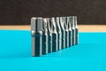 Close-up collection of tough metal bits for screwdriver or drill
