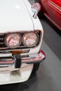 Close up Color detail on the headlight of a vintage car Royalty Free Stock Photo