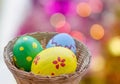 Close up of colored easter eggs in basket Royalty Free Stock Photo