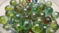Close-up of colored glass marbles in a glass jar Royalty Free Stock Photo