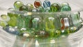 Close-up of colored glass marbles in a glass jar Royalty Free Stock Photo