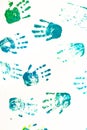 Close up of colored hand print on white background