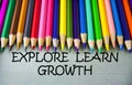 Close up colored pencil writing with EXPLORE , LEARN ,GROWTH .Education concept