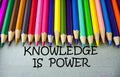 Close up colored pencil writing with KNOWLEDGE IS POWER .Education concept