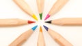 Close up of colored pencils in a circle on white background Royalty Free Stock Photo