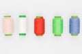 Colored spools of thread on a white background Royalty Free Stock Photo