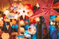 Close up of coloreful stars illuminated on Xmas tree at Christmas Market in Hamburg, Germany