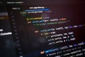 Close-up of colorful abstract programming code showing a recursive sorting algorithm on dark background, suitable for illustrating Royalty Free Stock Photo